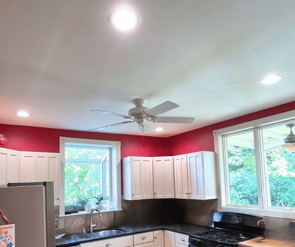 Kitchen with ceiling fan and recessed lights 